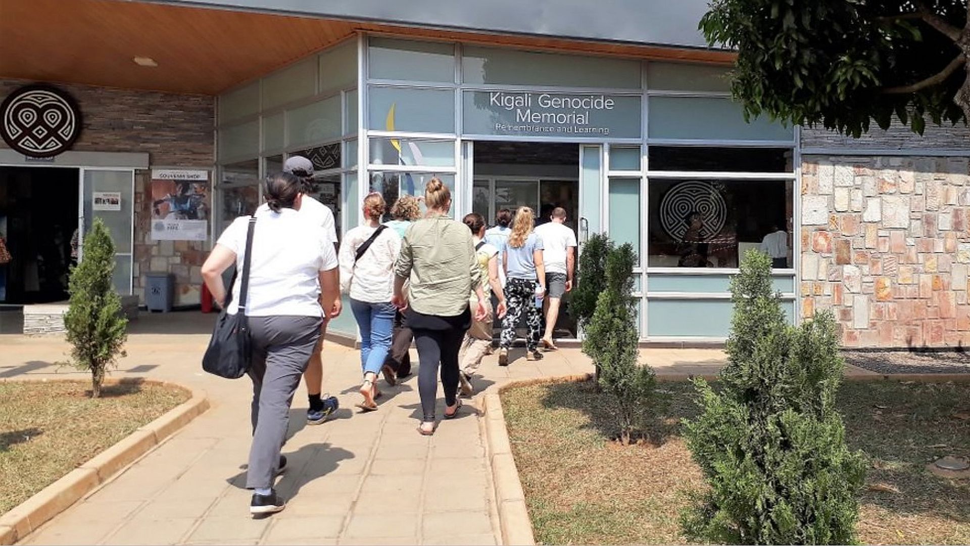 tourists entering kigali genocide memorial site on a kigali city tour enroute a 2 days rwanda gorilla trek