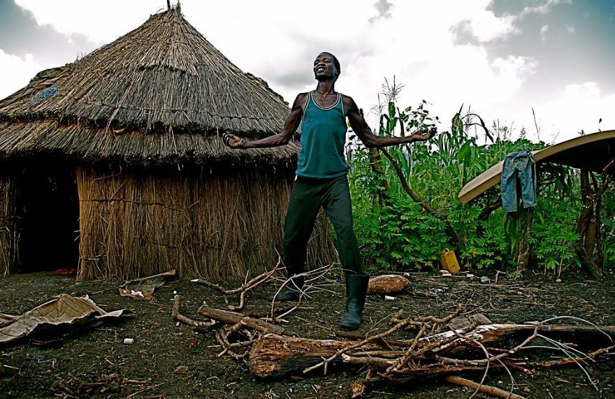 karamajong native chills at his home stead at Pian Upe Game Reserve